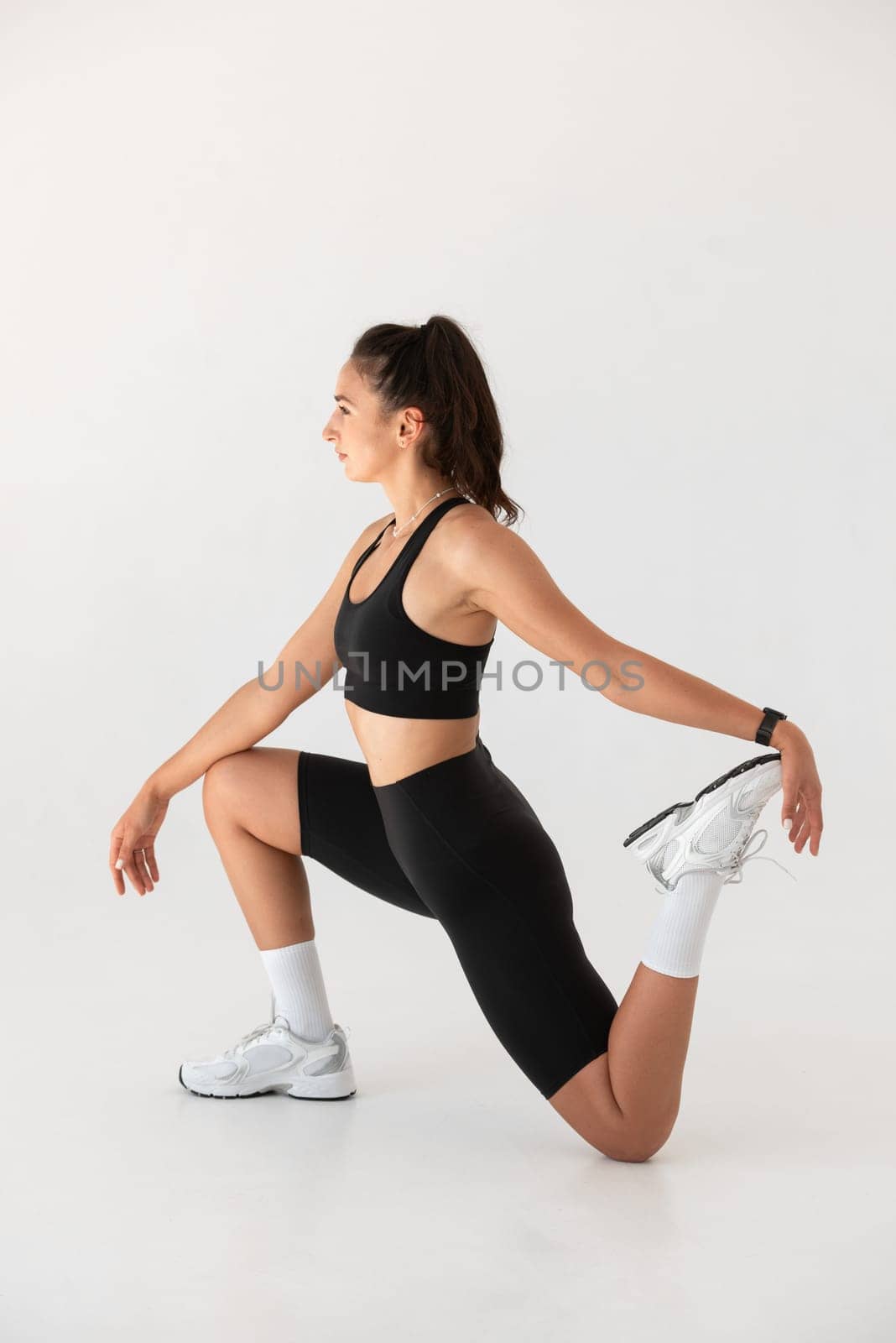 Smiling healthy woman doing yoga at home. pilates