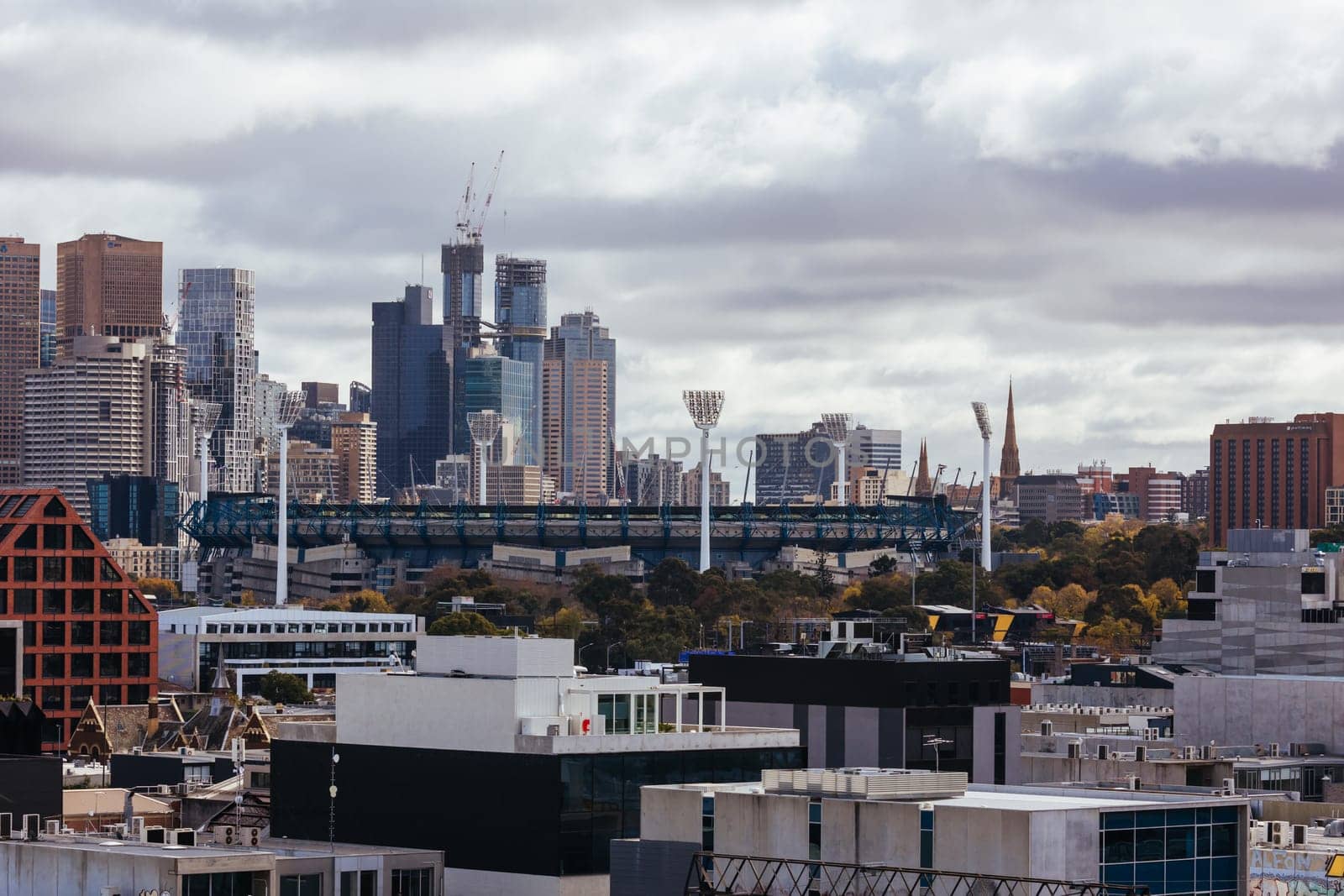 MELBOURNE, AUSTRALIA - JUNE 10, 2022: View towards Melbourne Cricket Ground and Melbourne skyline from a high rise building in Cremorne in Australia