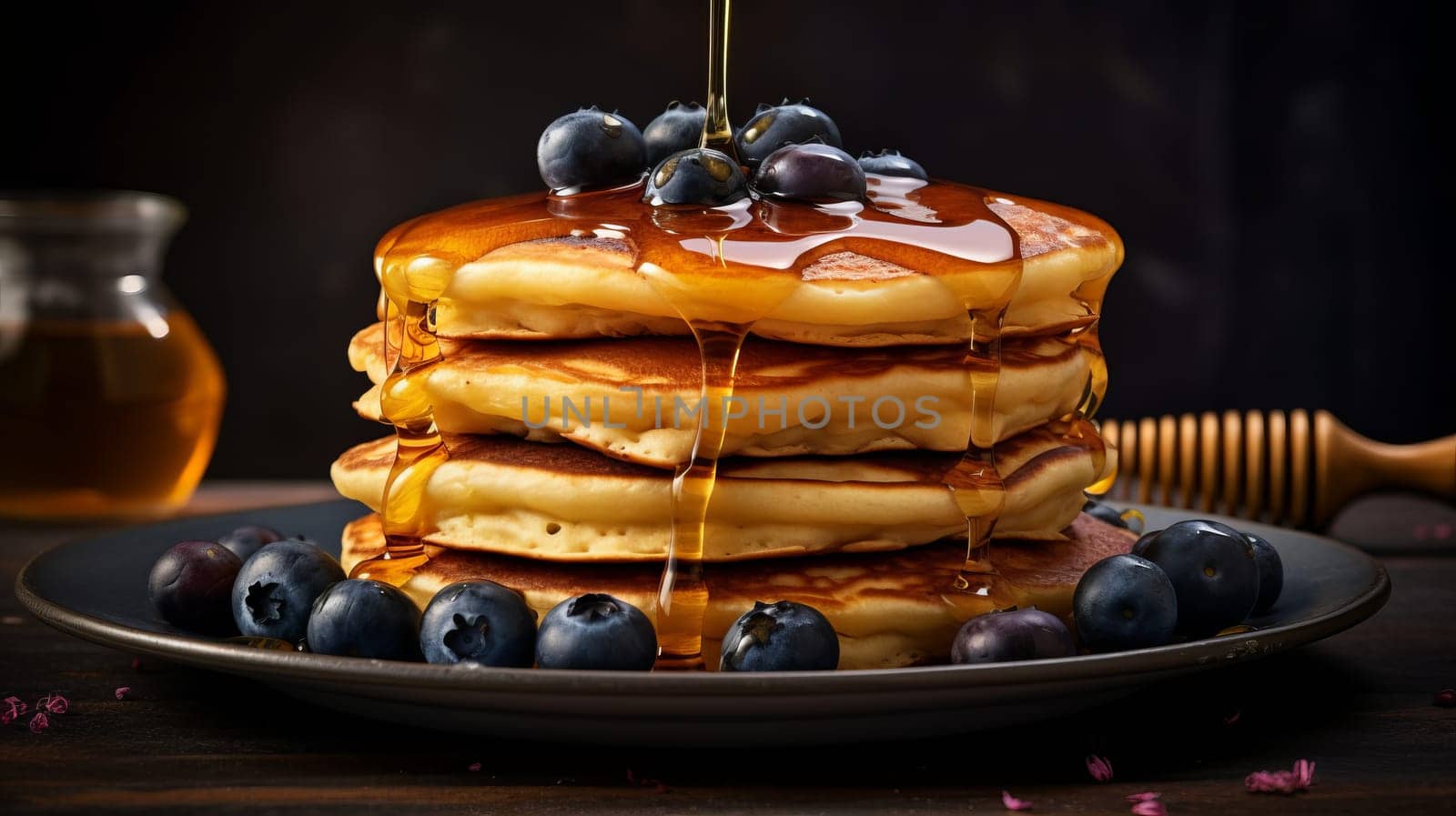 A Delicious Stack of Fluffy Pancakes Topped With Fresh Blueberries and Sweet Syrup.