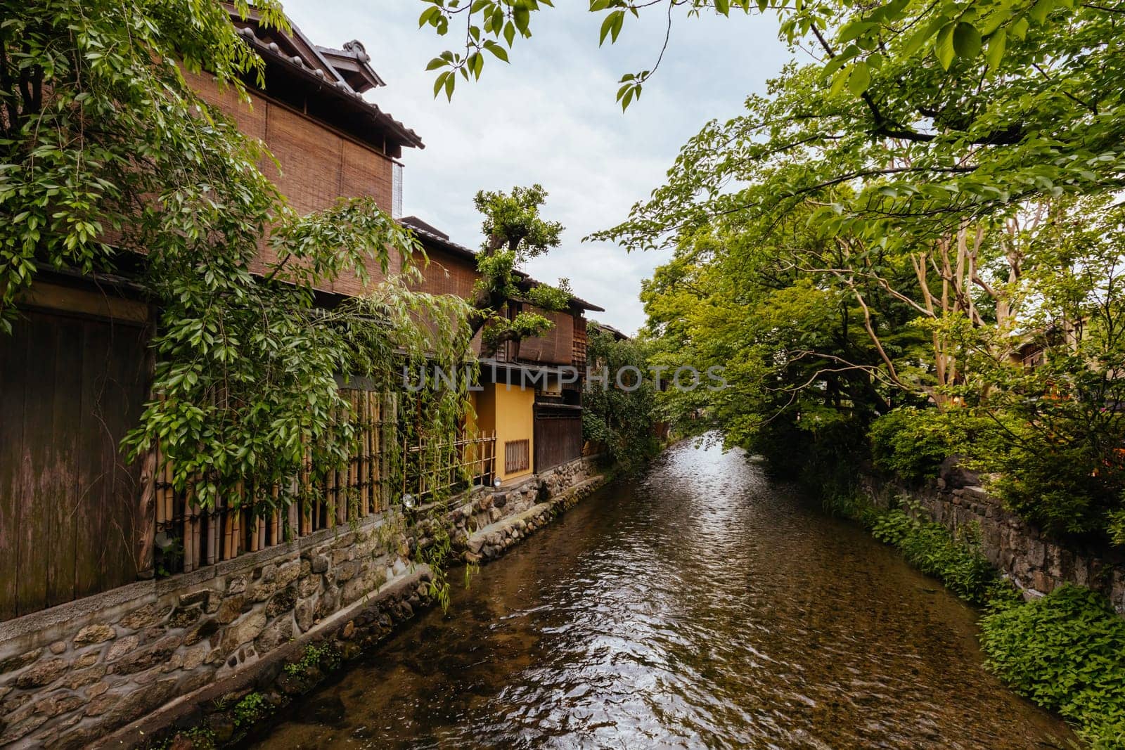 KYOTO, JAPAN - MAY 14, 2019: Beautiful traditional streetscape around Shirakawa Lane during the day in Higashiyama district in Kyoto, Japan