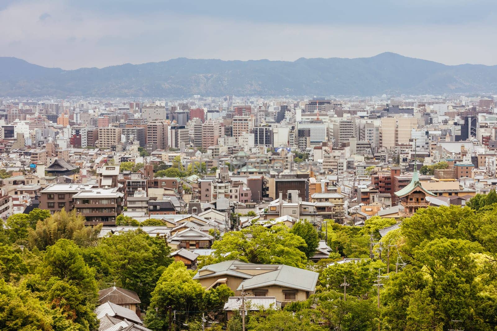 The view over Kyoto city from Higashiotani Cemetery on a spring afternoon in Japan
