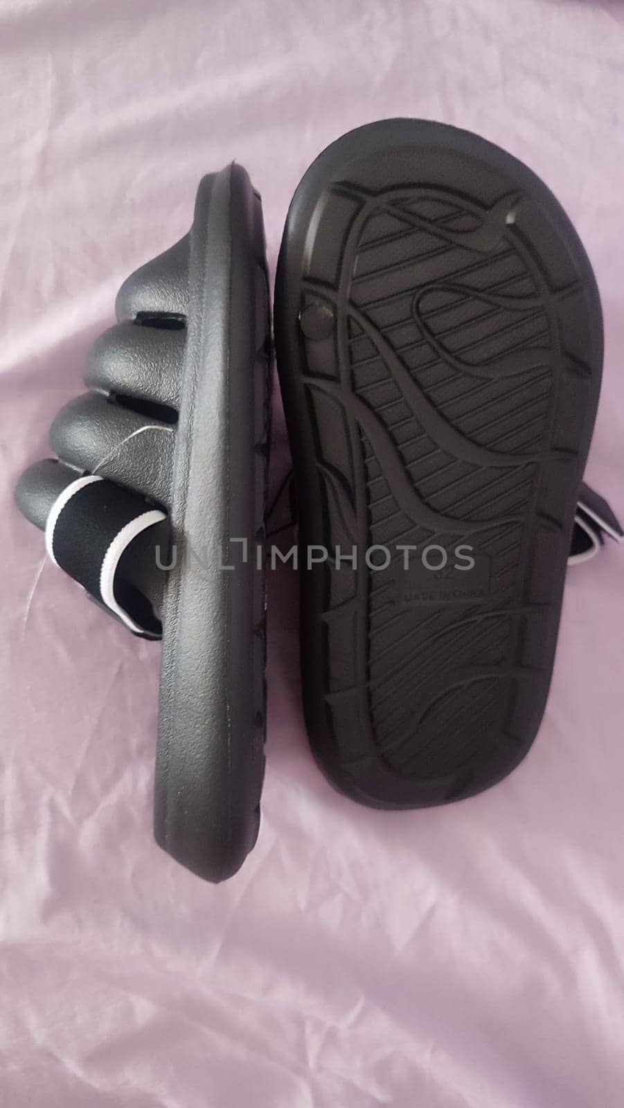black summer rubber flip flops shoes slippers slates. High quality photo