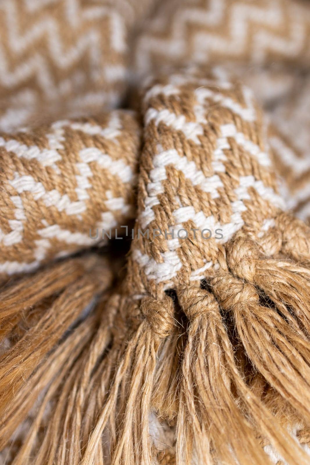 Vertical wallpaper for textile products.Warm wool blankets in autumn colors with rustic bangs. Close up photo. Rustic background