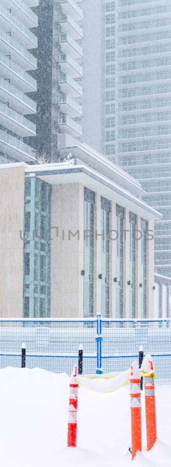 Residential district on the final stage of construction under snow fall in Vancouver.