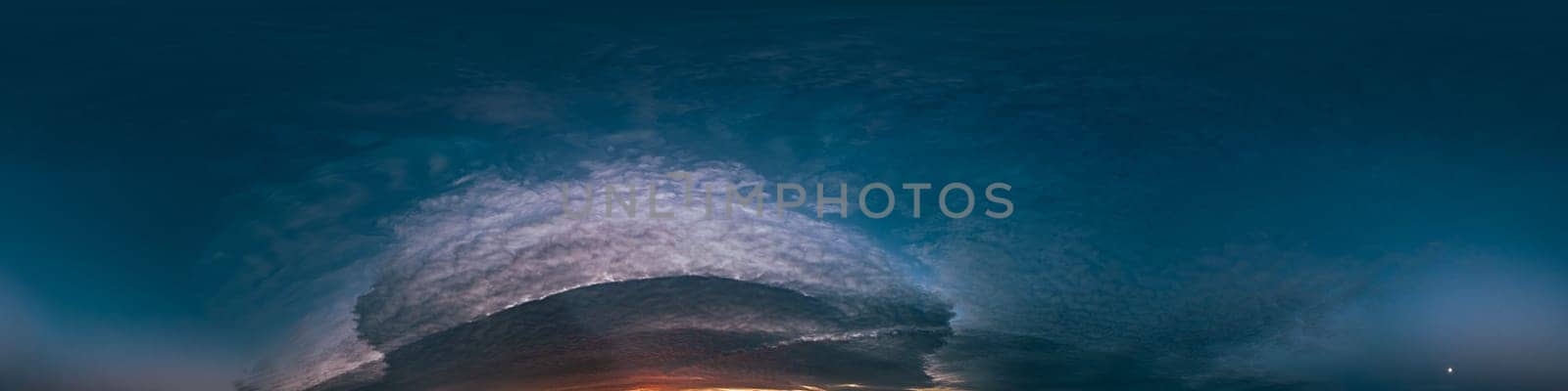Dramatic Sunset sky 360 panorama. Vibrant sky with bright glowing red pink Cumulus clouds. HDR 360 seamless spherical panorama. Sky dome for aerial drone panoramas. Climate and weather change