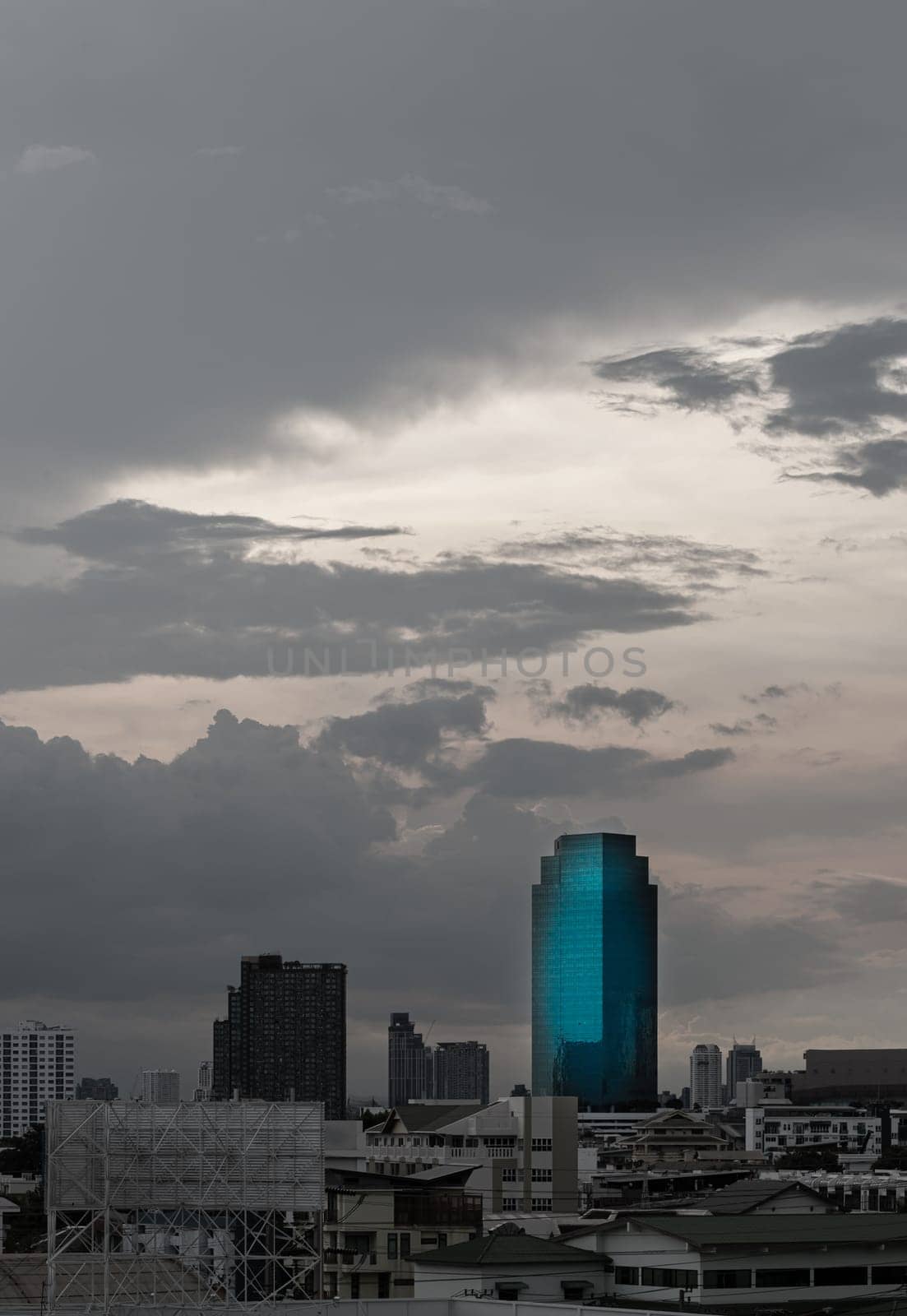Bangkok, Thailand - 14 Aug, 2024 - Architecture exterior of Modern high-rise buildings of Dramatic sky in the city of Bangkok. Picturesque view of skyscrapers before Sunset, Space for text, Selective focus.