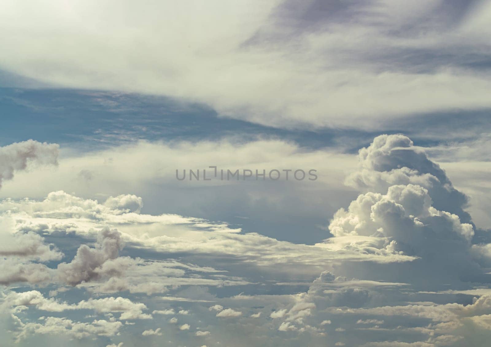 Dramatic cloud like a heaven with the light shining from the sun. The sky is being covered with amazing cloudy, Concept idea of Imaginative clouds nature, Nature abstract composition for background wallpaper and textures, Selective focus.