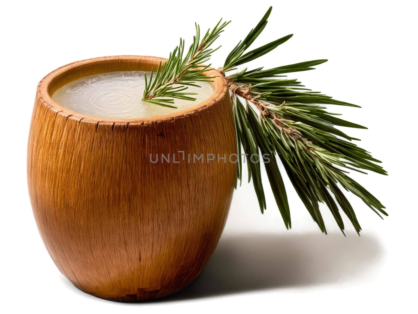 Palm Wine traditional African palm wine served in carved wooden cup and garnished with sprig. Food isolated on transparent background.