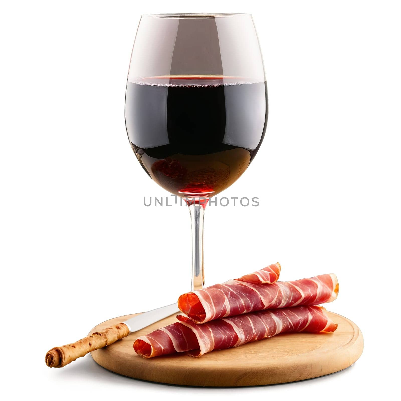 Sangiovese in a stemmed glass bright ruby red accompanied by a slice of prosciutto and.