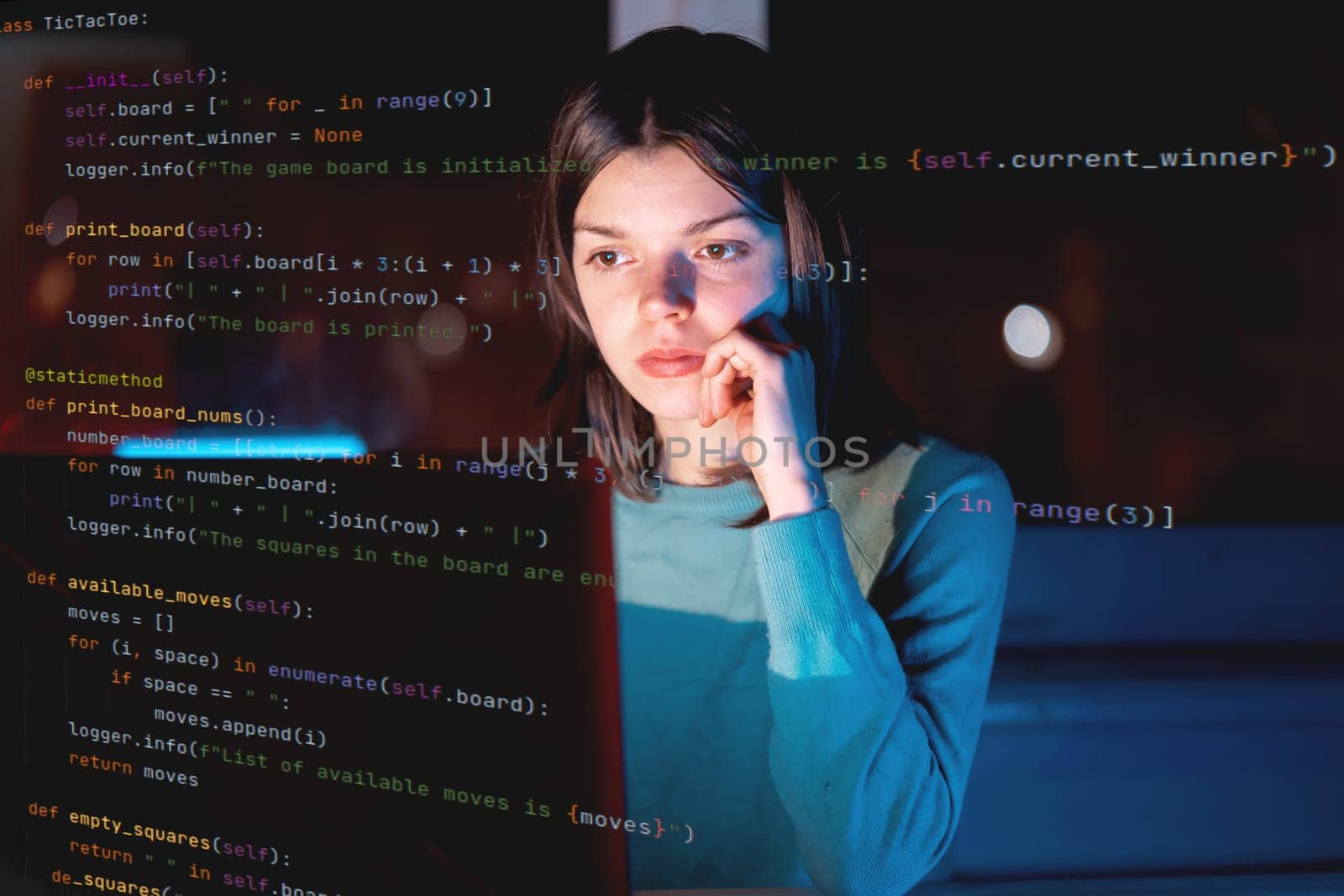 A young girl works on a laptop late at night online, a woman is coding, writing a program, using her device to create a new project and e-learning, getting an IT education for future development.