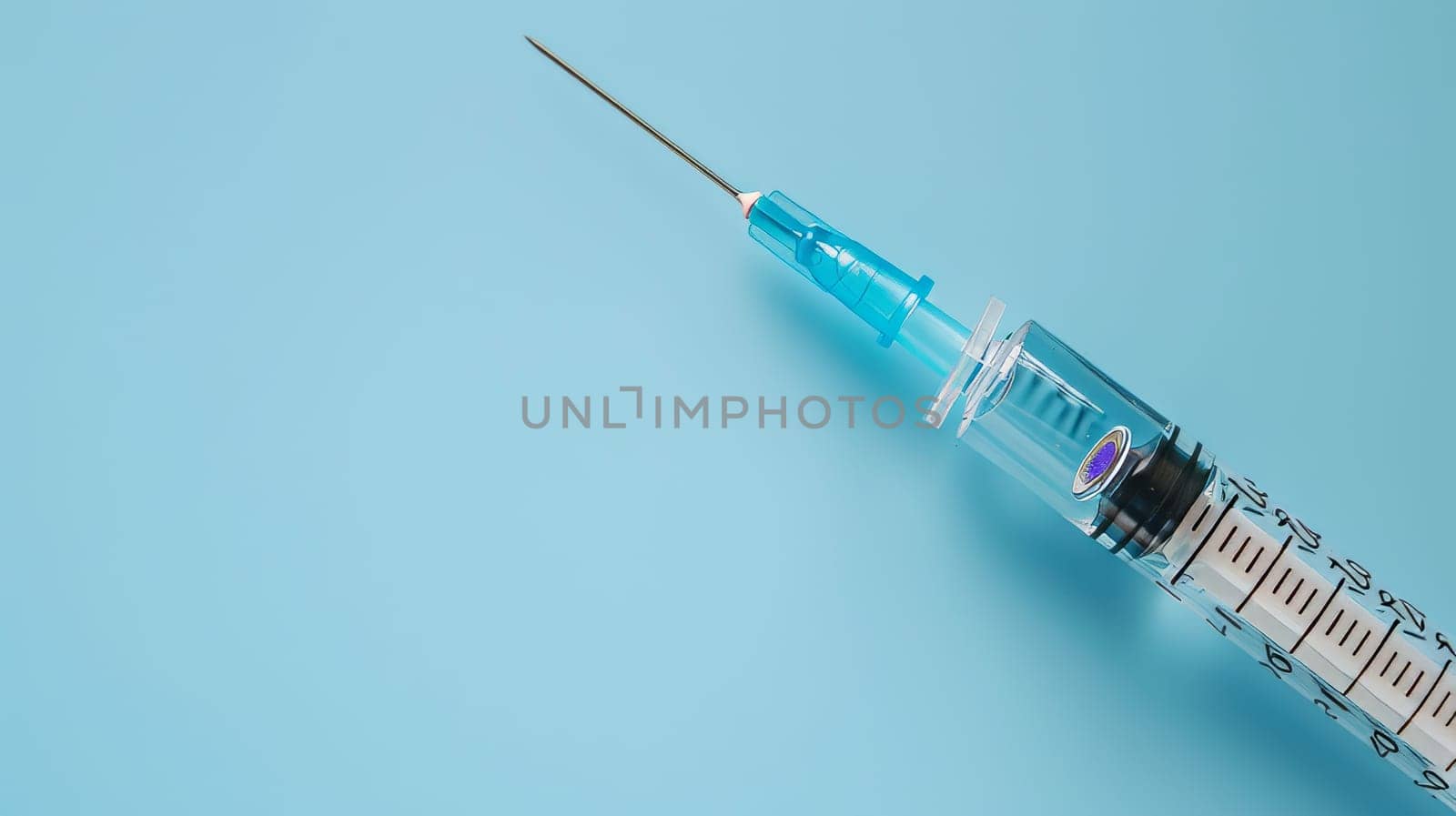Syringe with Botox with blue background, space for text, beauty procedure concept