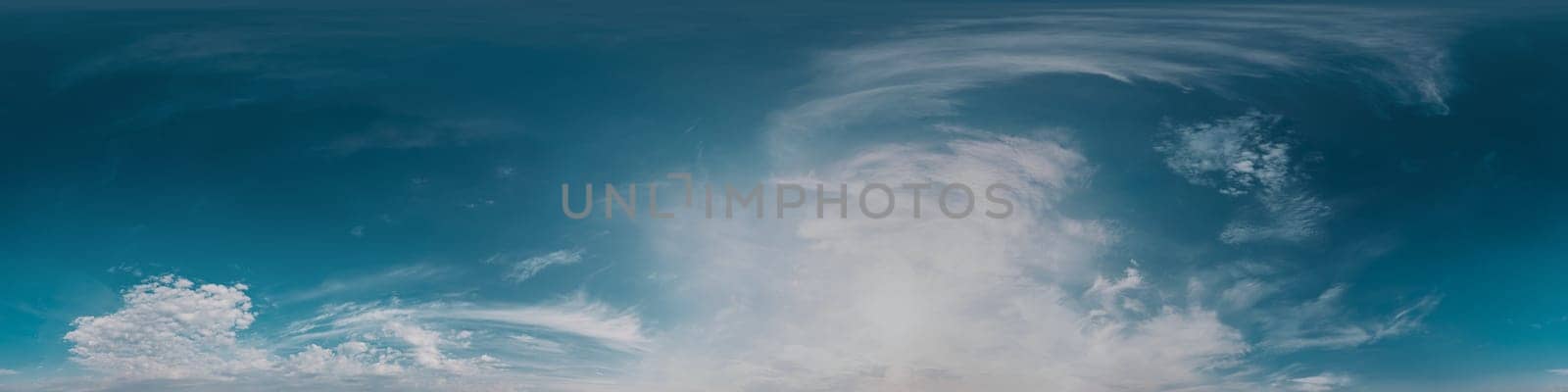 360 panorama of glowing sunset sky with bright Cirrus clouds. Seamless hdr spherical 360 panorama. Sky dome in 3D visualization, sky replacement for aerial drone panoramas. Weather and climate change.