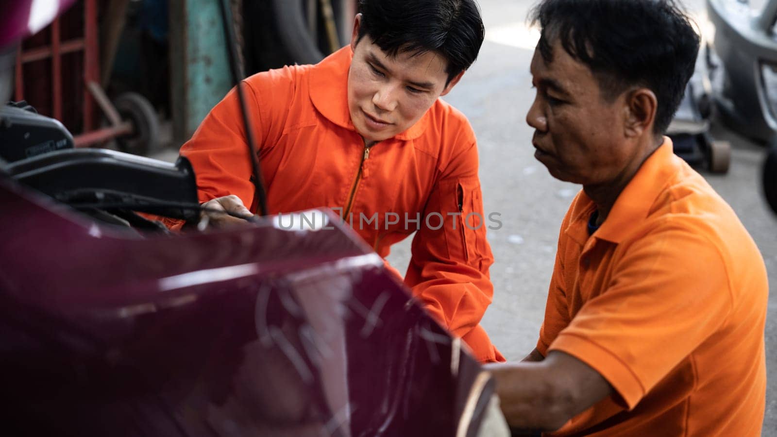 Panoramic banner automotive service mechanic inspect and diagnose car engine issue, repairing and fixing problem in workshop. Technician car care maintenance working on internal components. Oxus