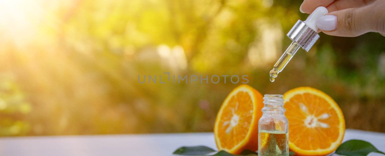 orange essential oil. selective focus