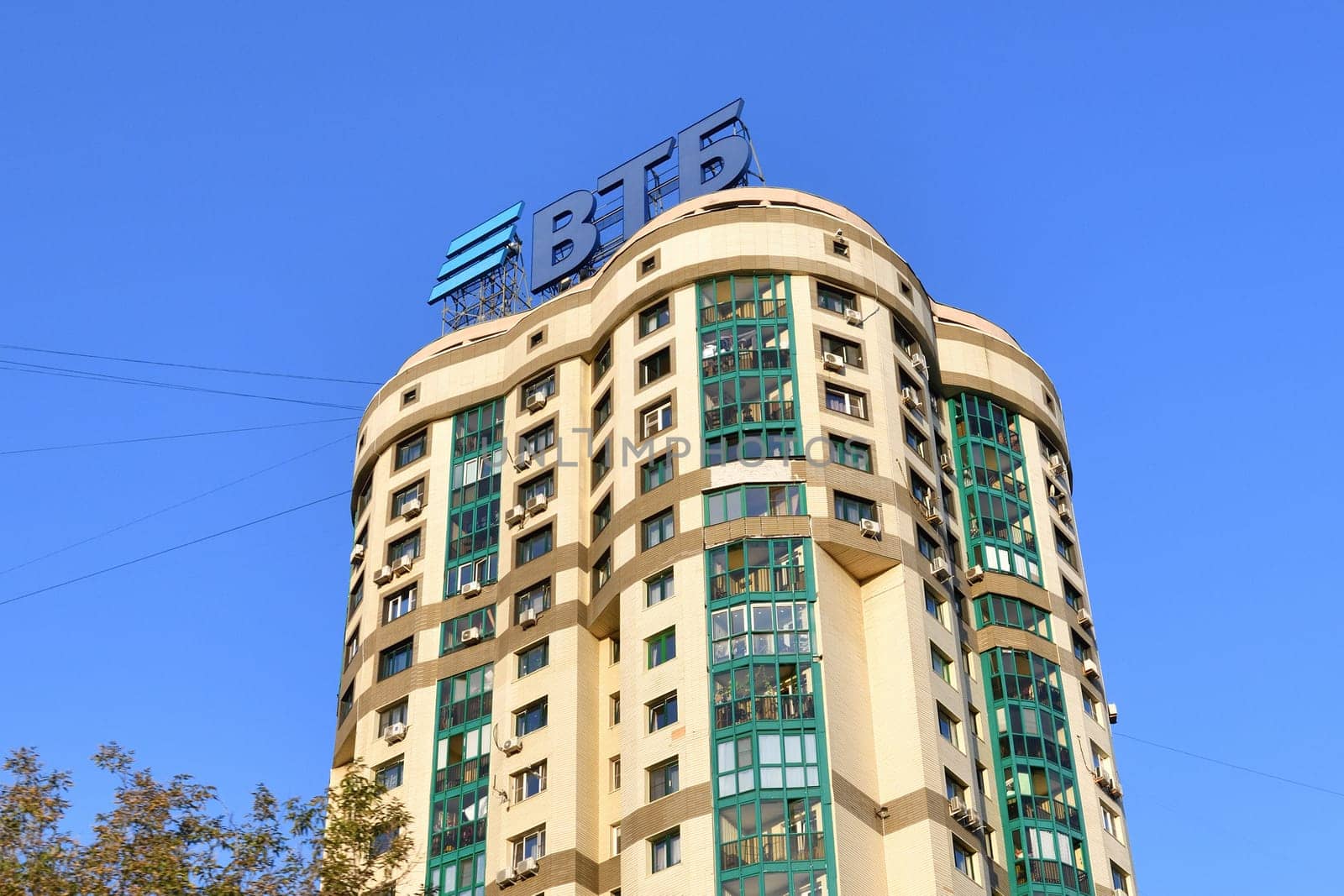 Moscow, Russia - Aug 3. 2024. VTB Bank advertisement on the roof of multi-story residential building. LETTERS