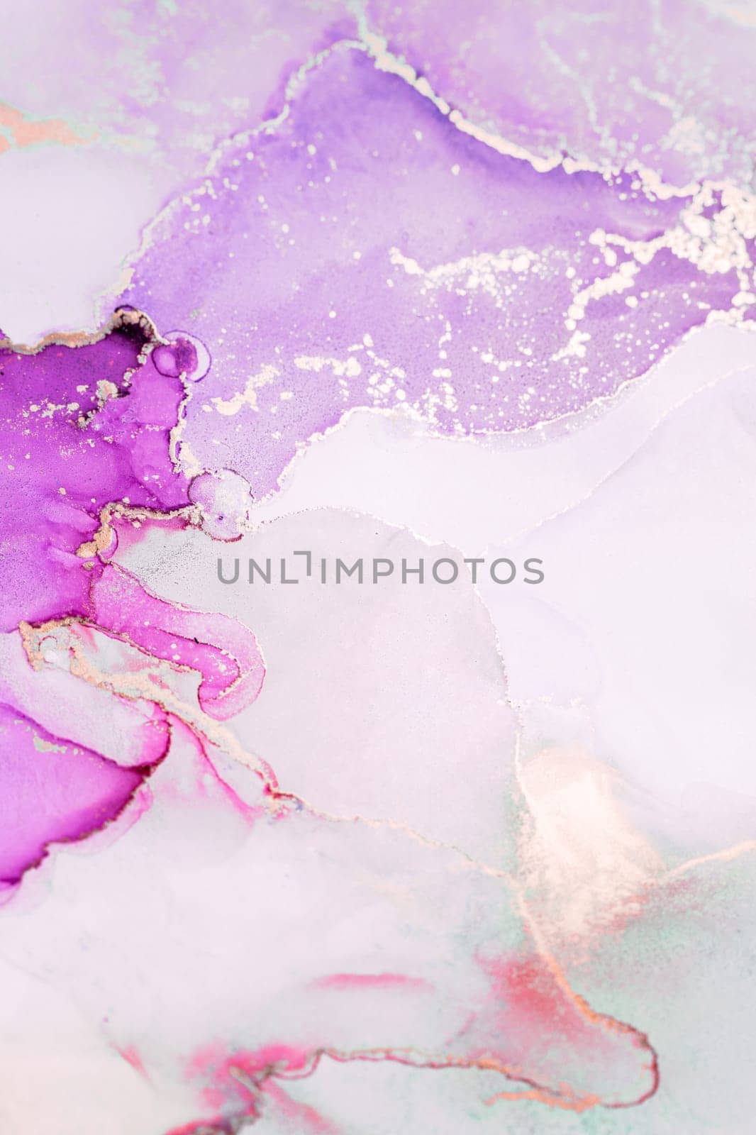 Abstract artwork showcases vibrant shades of purple with delicate gold accents, creating a fluid and captivating design that enhances any contemporary decor.