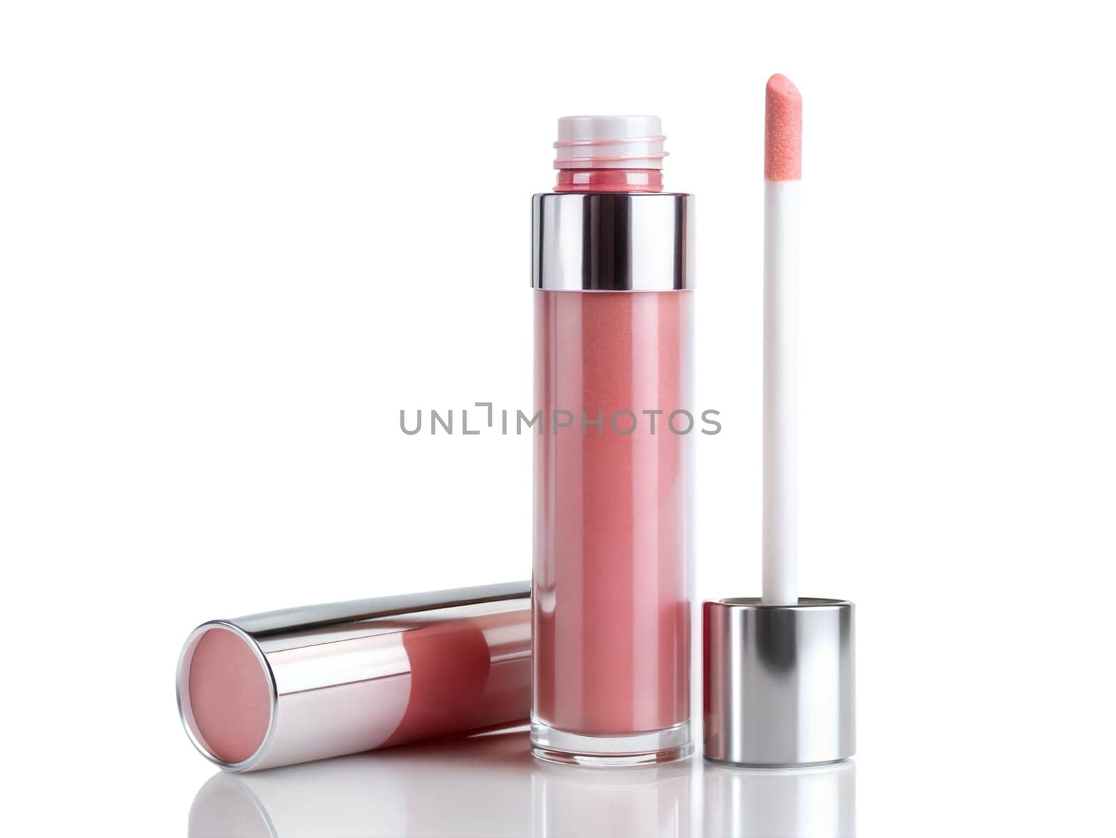 Opened pink lip gloss on white background. High quality photo