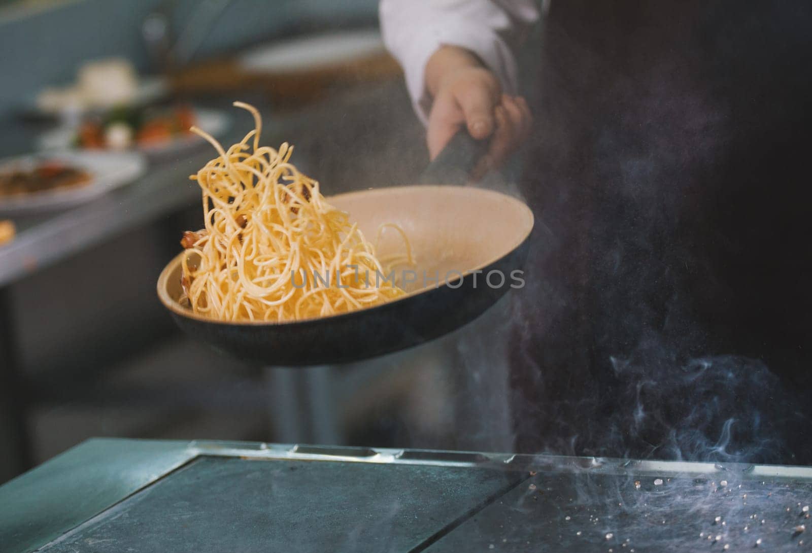 Process of cooking spaghetti, close-up view, horizontal