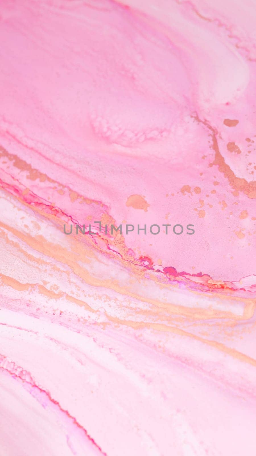 The background showcases a delicate pink marble surface featuring flowing patterns and subtle gold accents, perfect for creative projects or elegant designs.