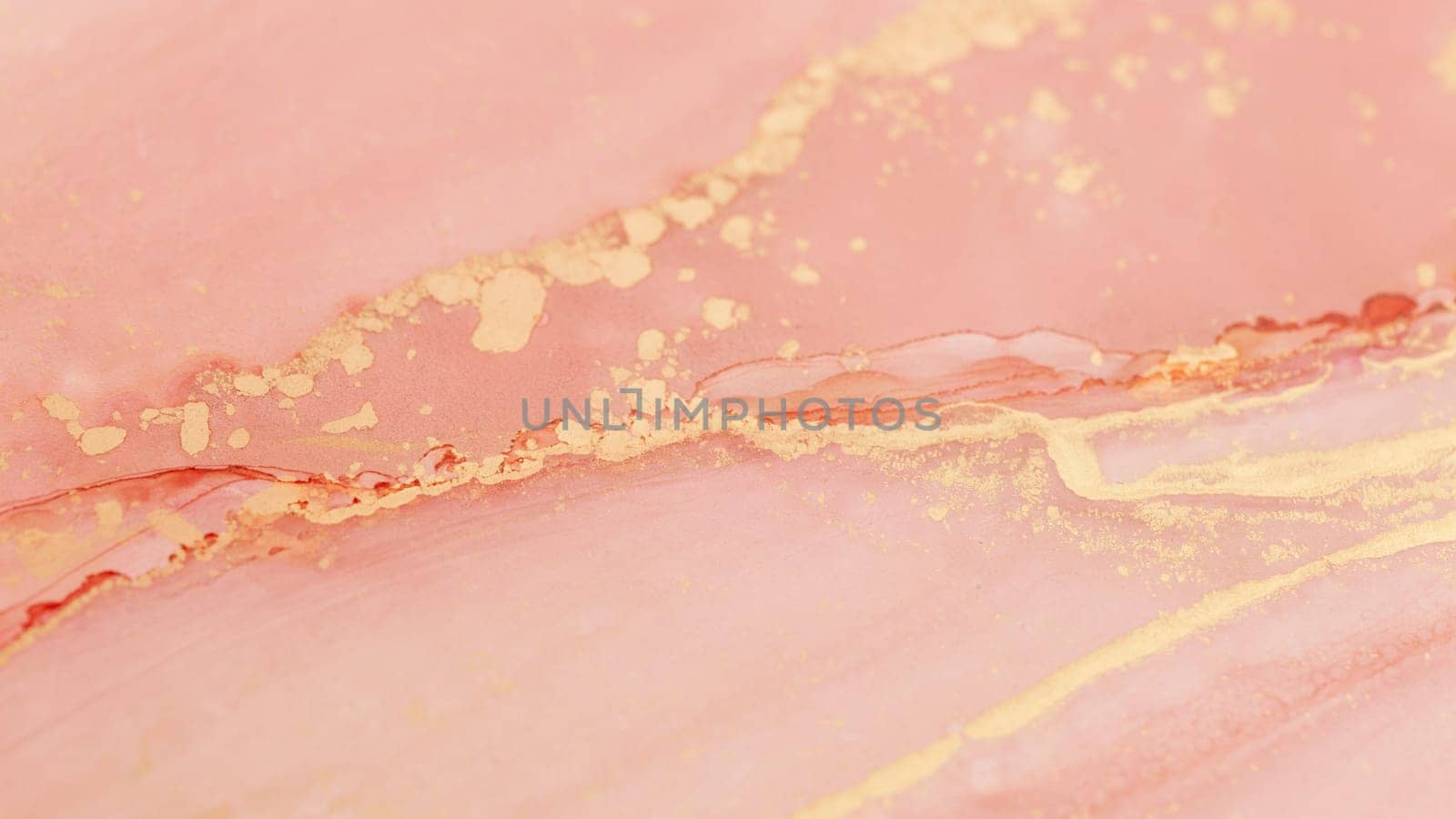 A beautiful abstract composition features gentle pink hues blended with shimmering gold accents, creating a soft and inviting visual experience. The fluid patterns evoke a sense of elegance.