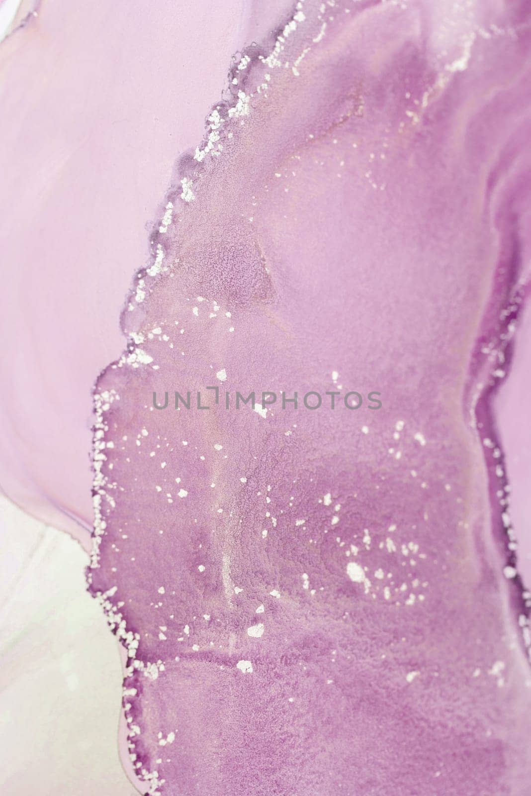 This captivating marbled texture features a blend of soft purple hues and subtle glittering accents, evoking a serene atmosphere ideal for home decor or art inspiration.