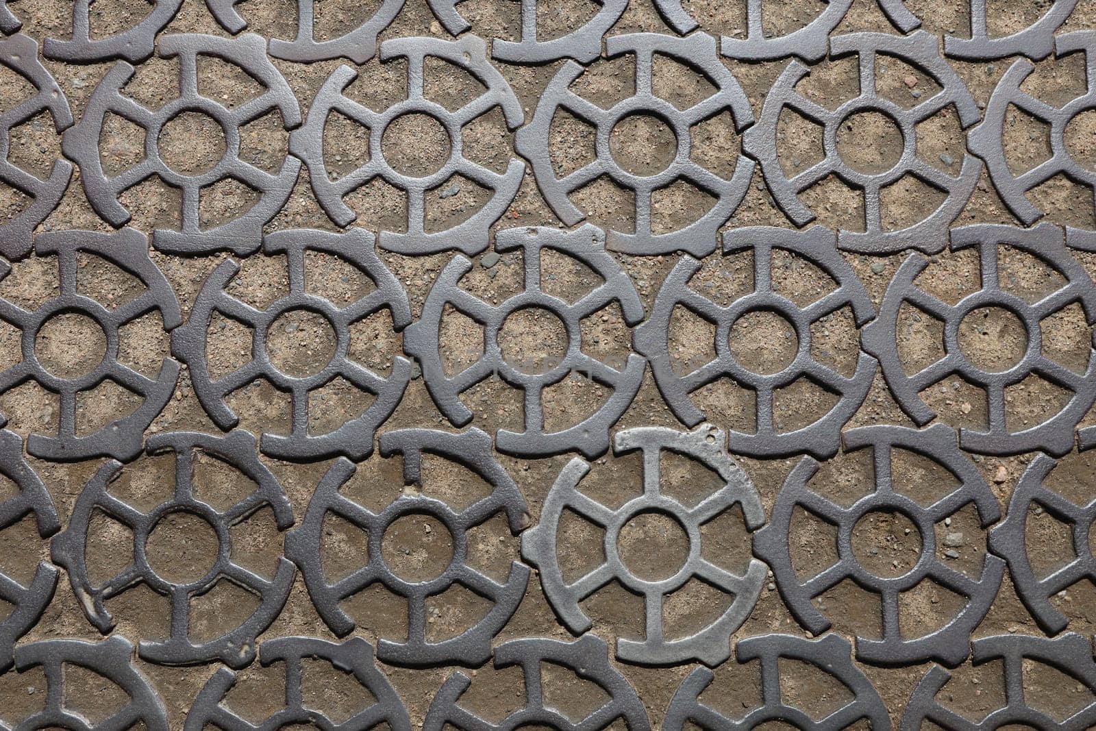 A fragment of a cast-iron Kronstadskaya sidewalk. top view.