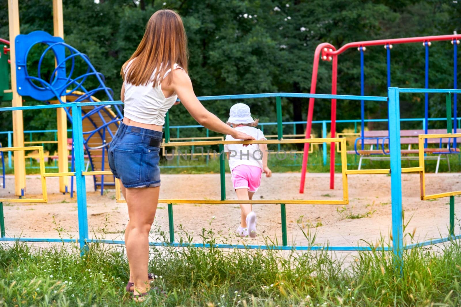 an outdoor area provided for children to play in, especially at a school or public park