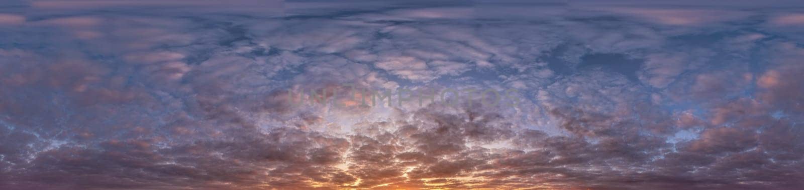 Golden sunset sky panorama Seamless spherical equirectangular 360-degree view with beautiful Stratocumulus clouds, setting sun - for use in 3D graphics as a sky dome or post-processing of drone images.