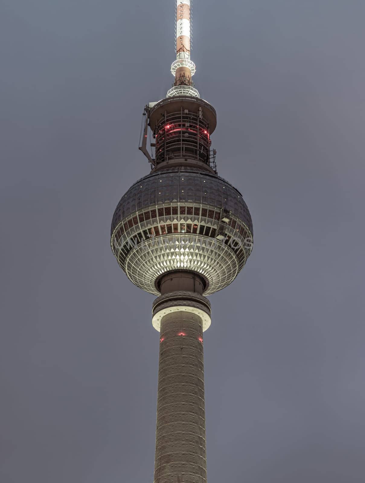 Berlin, Germany - Dec 18, 2023 - Famous Berlin Television Tower (Fernsehturm) with night sky background near Alexanderplatz in Berlin, A Tourist attraction and Meeting place, Space for text, Selective focus.