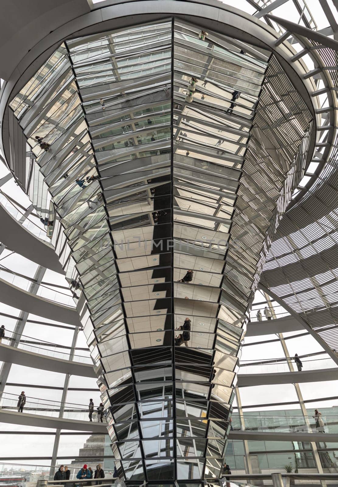 Berlin, Germany - Dec 20, 2023 - Architecture interior of the Cupola of the Reichstag dome is a glass dome constructed on top of the rebuilt Reichstag building. a major tourist attraction of the berlin city, Space for text, Selective focus.