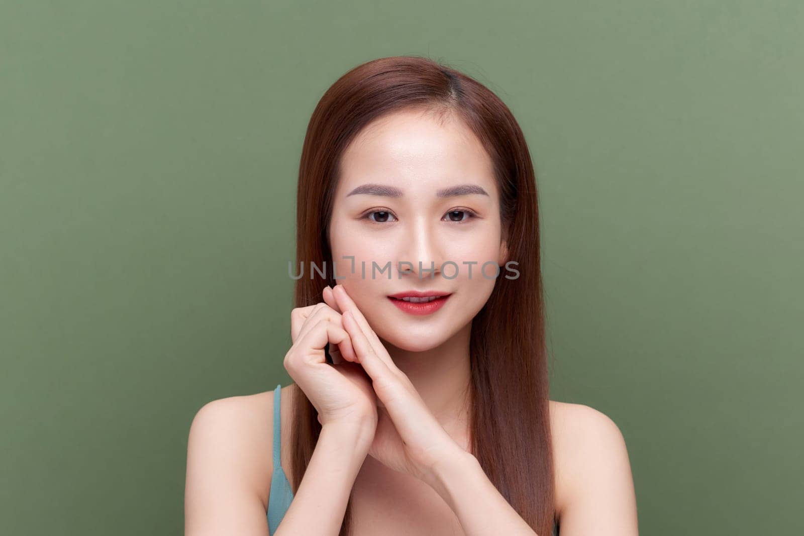 Portrait of young woman with perfect skin clean