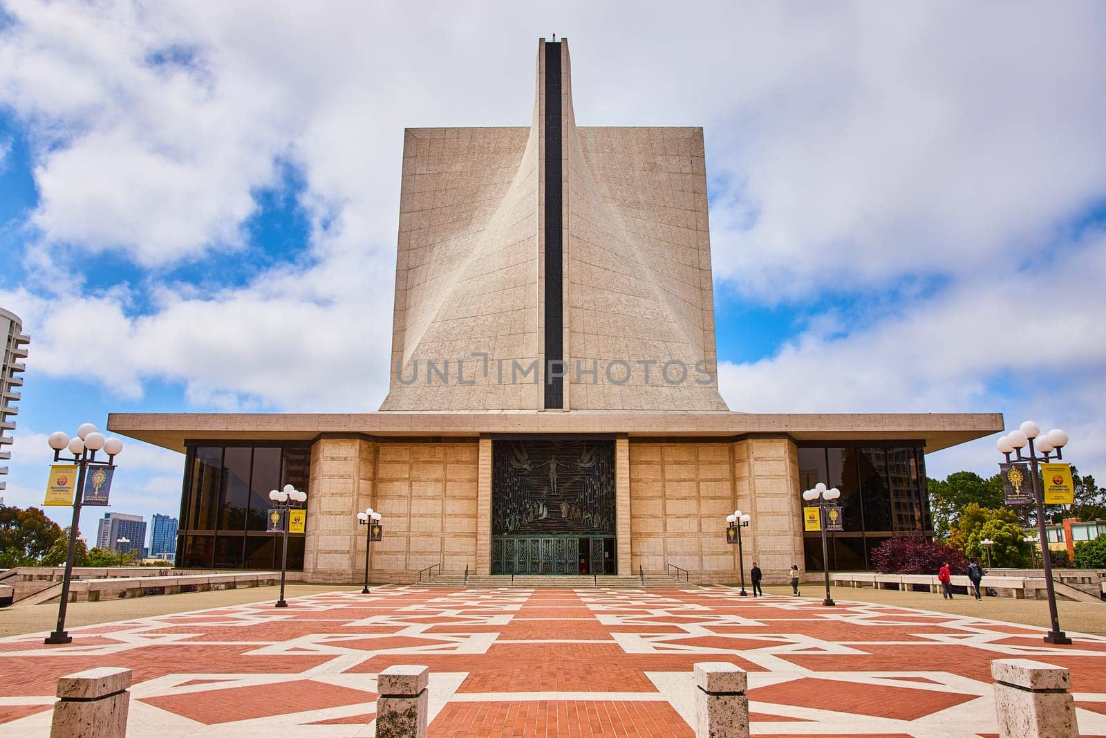 Image of Straight on shot of Cathedral of Saint Mary of the Assumption entrance with cloudy blue sky