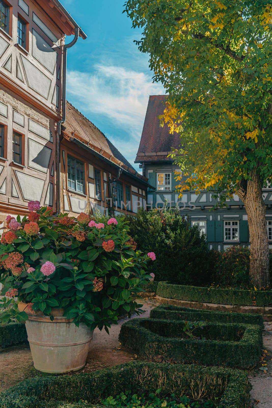 Old national German town house. Old Town is full of colorful and well preserved buildings. Baden-Wurttemberg is a state in southwest Germany bordering France and Switzerland. The Black Forest, known for its evergreen scenery and traditional villages, lies in the mountainous southwest. Stuttgart, the capital, is home to Wilhelma, a royal estate turned zoo and gardens. Porsche and Mercedes-Benz have headquarters and museums there. The 19th-century Hohenzollern Castle sits in the Swabian Alps to the south.