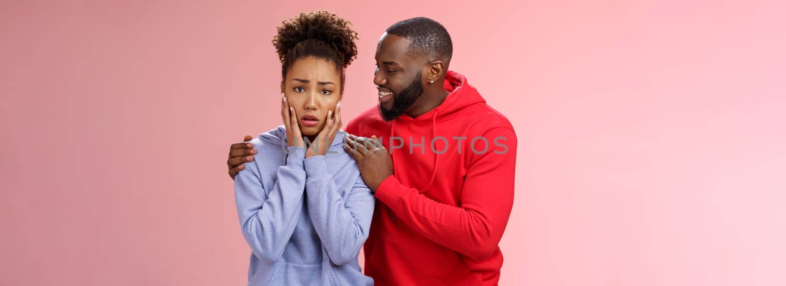 Boyfriend comforting worried nervous girlfriend attend dentist frowning touching face anxiously panicking man hugging girl touch shoulders smiling encourage, look supportive assuring all okay.