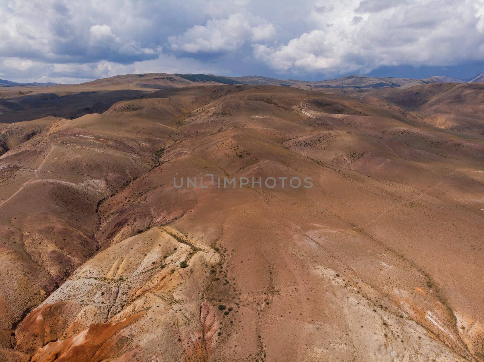 Aerial drone view of colorful eroded landform of Altai mountains in popular tourist location called Mars, Chagan-Uzun, Altai Republic, Russia