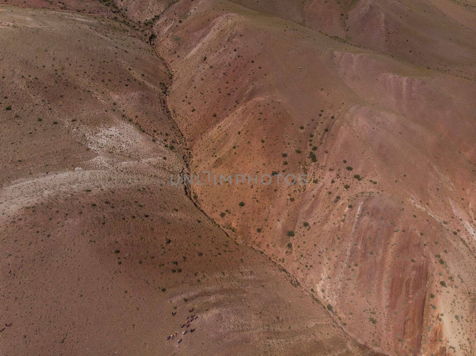 Aerial drone view of colorful eroded landform of Altai mountains in popular tourist location called Mars, Chagan-Uzun, Altai Republic, Russia