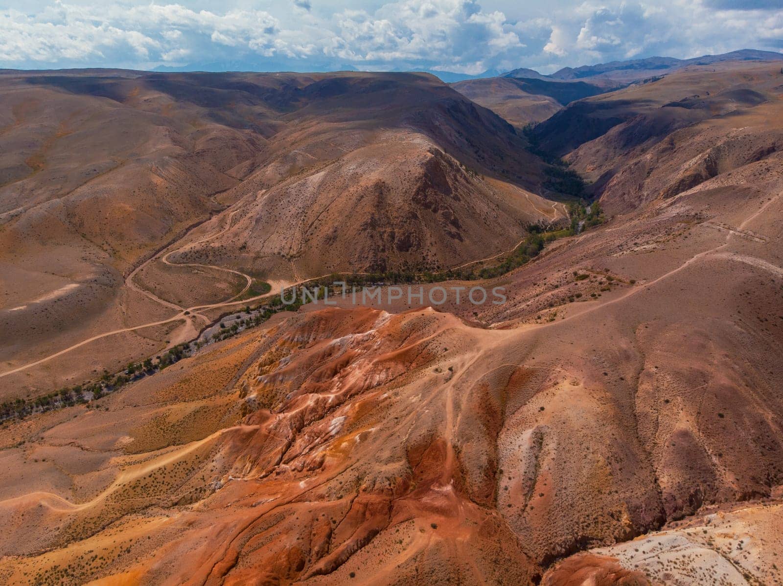 Aerial drone view of colorful eroded landform of Altai mountains in popular tourist location called Mars, Chagan-Uzun, Altai Republic, Russia
