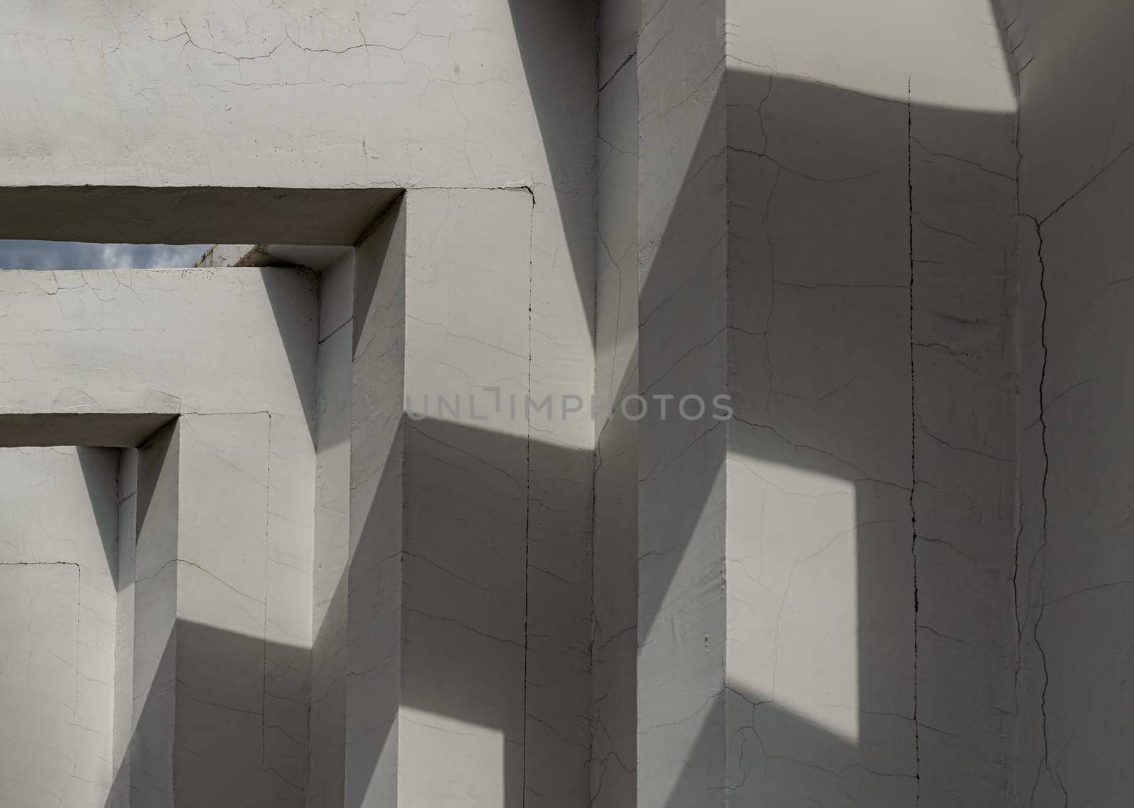 Sunlight shines through of Cement columns of Minimalist architecture modernism. White concrete pillars the exterior of the building, Copy space, Selective Focus.