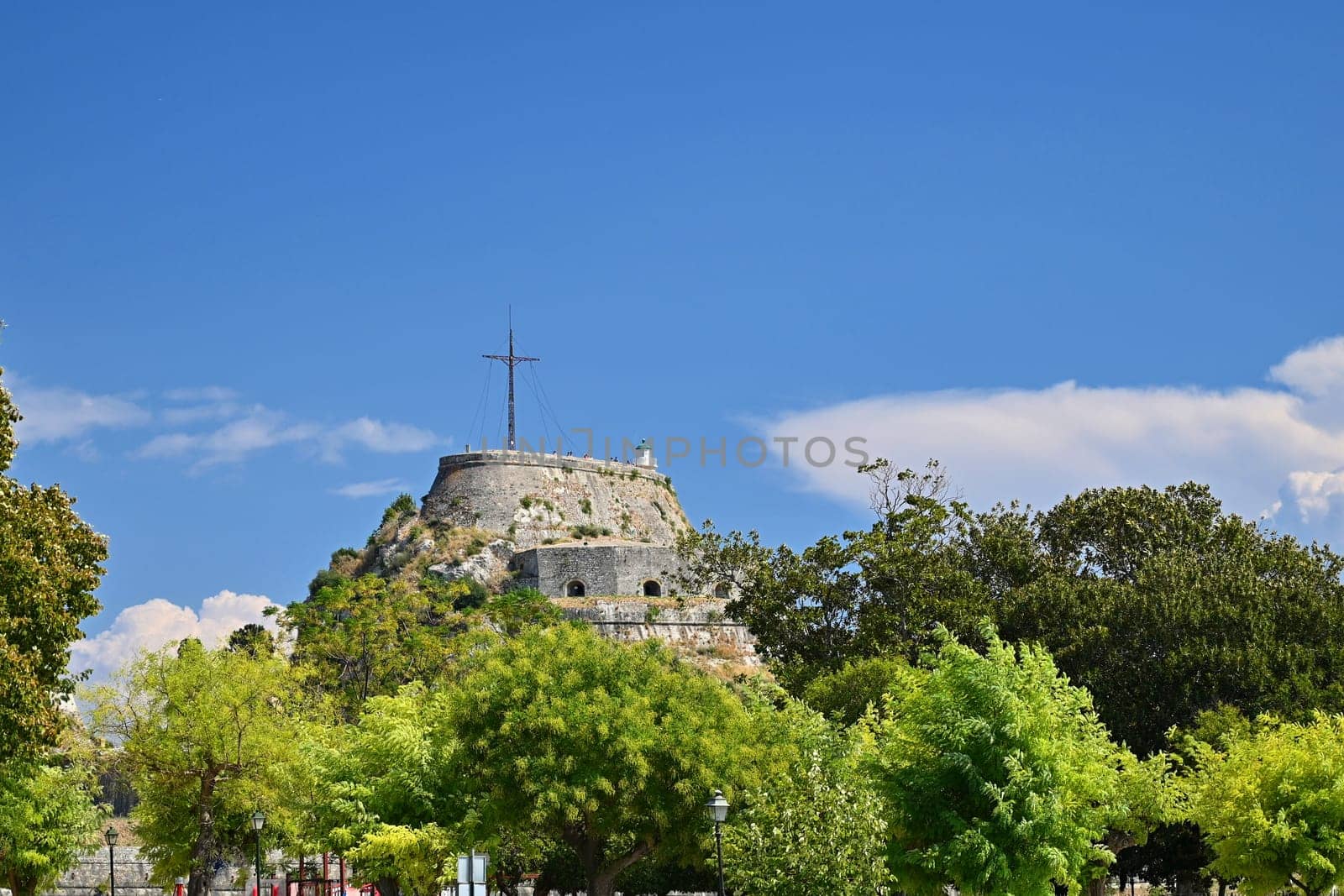 Port in the city of Kerkyra on the island of Corfu - Greece.
An old fortress with ships and a beautiful Mediterranean landscape.