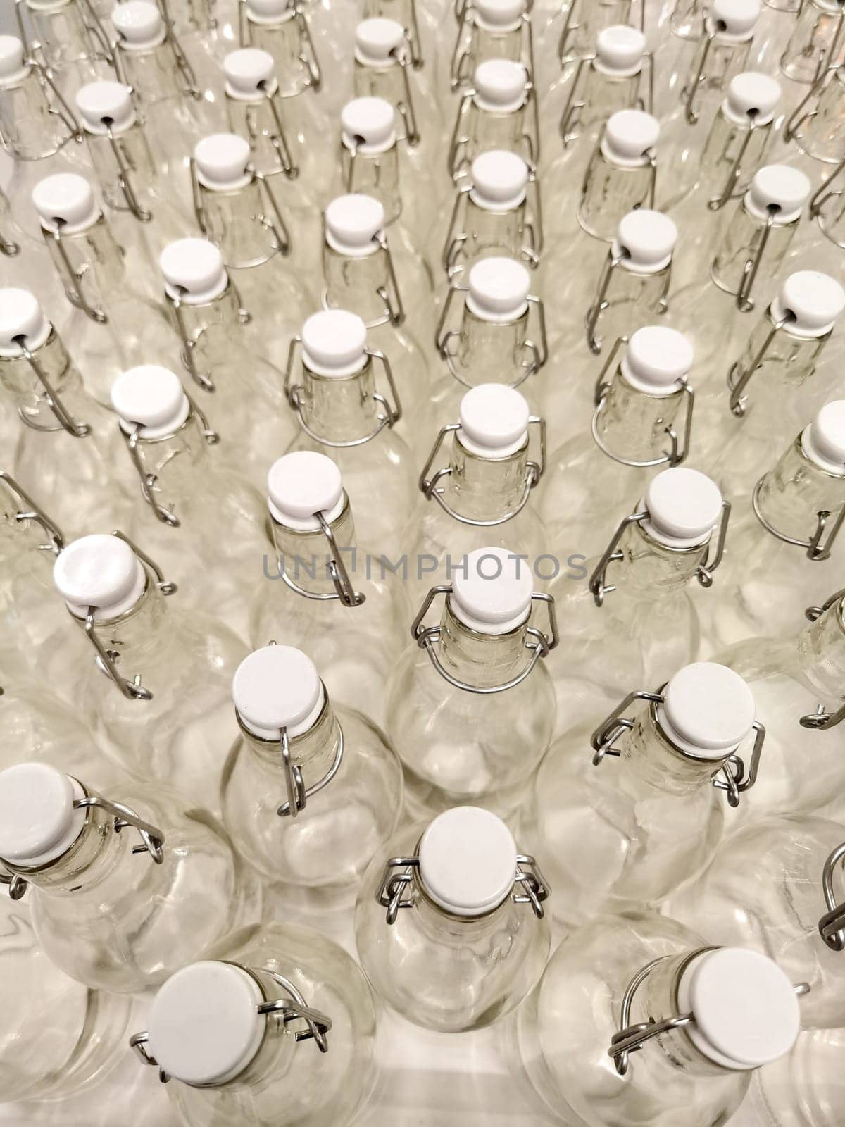 View of many empty glass bottle from above	 