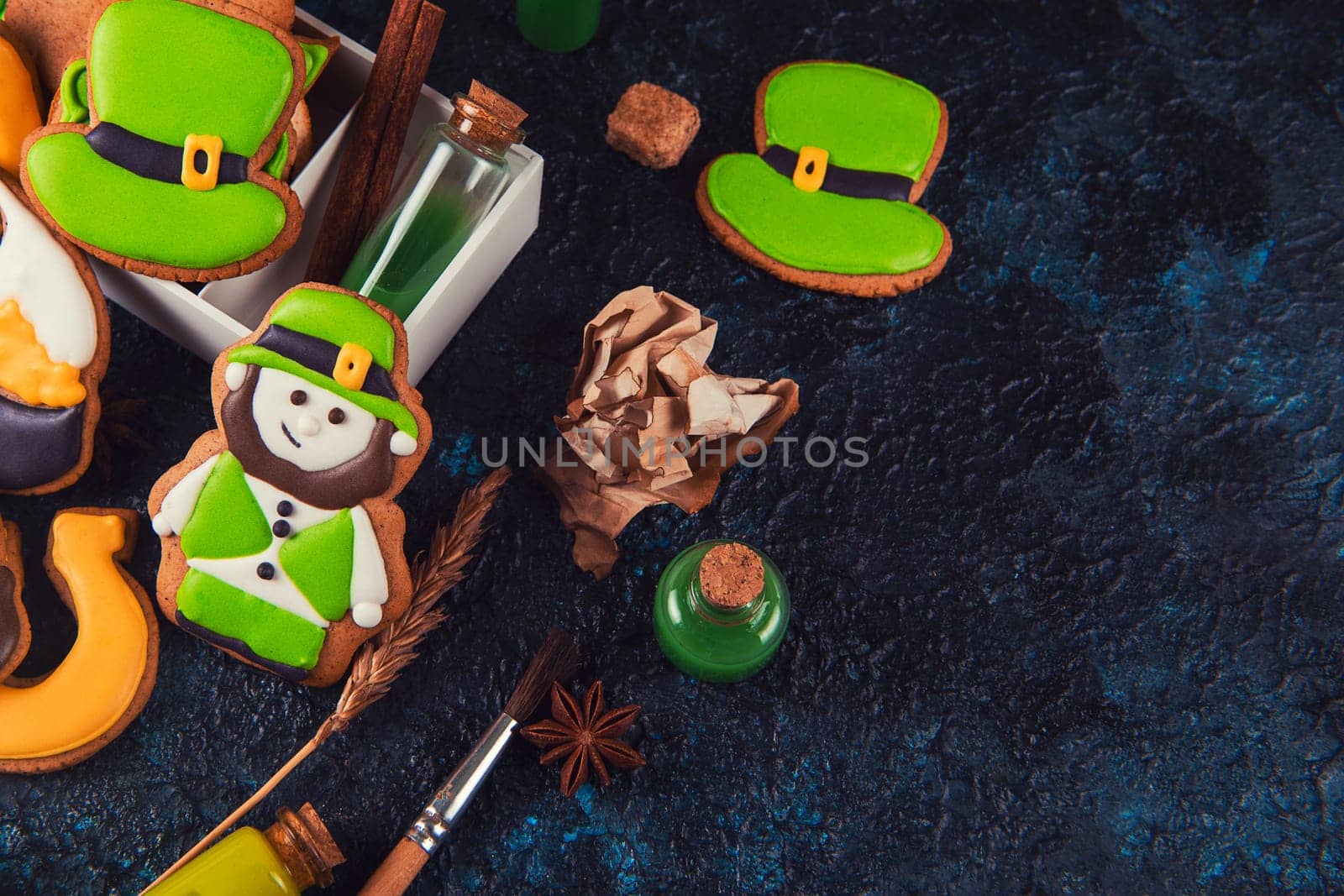 Gingerbreads cookies for Patrick's day on concrete background