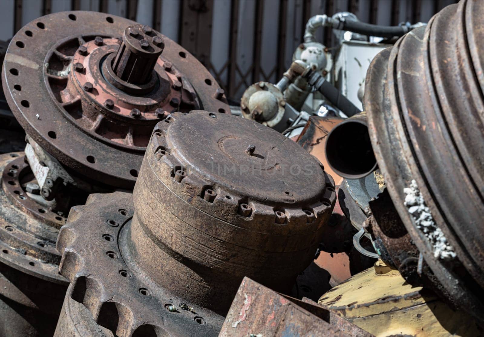 Old tractor parts, Rusty ndustrial machinery and other used at second hand parts car shop. Recycling, Space for text, Selective focus.