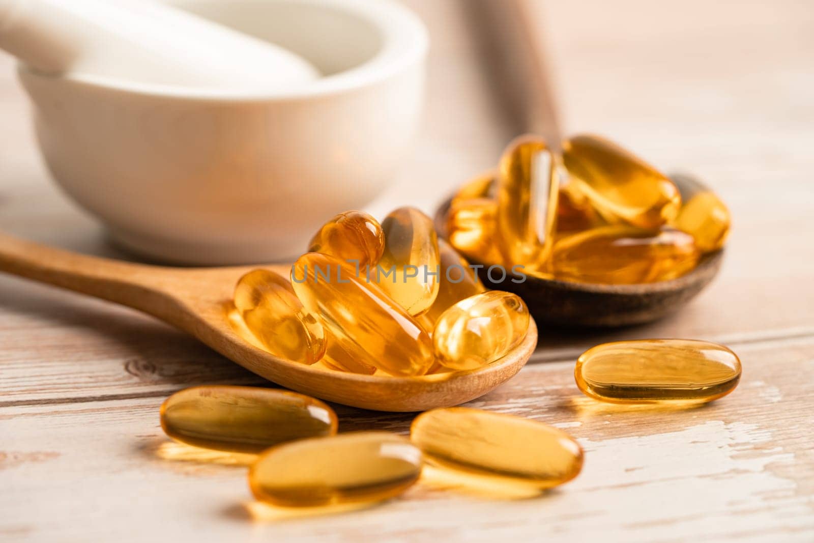 Fish oil Omega 3 capsules vitamin with EPA and DHA isolated on white background.