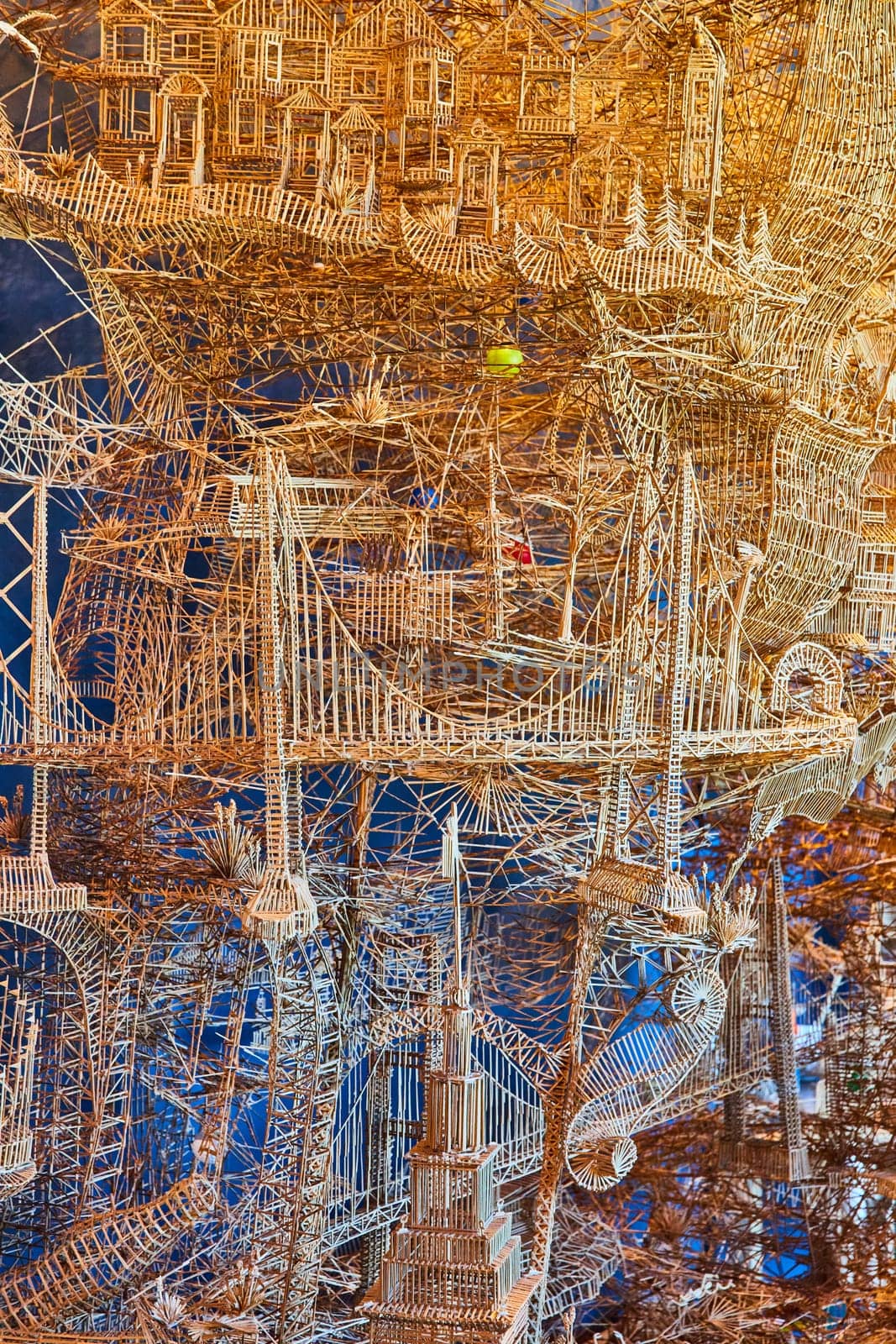 Image of Toothpick art with thousands of toothpicks made into complex marble maze