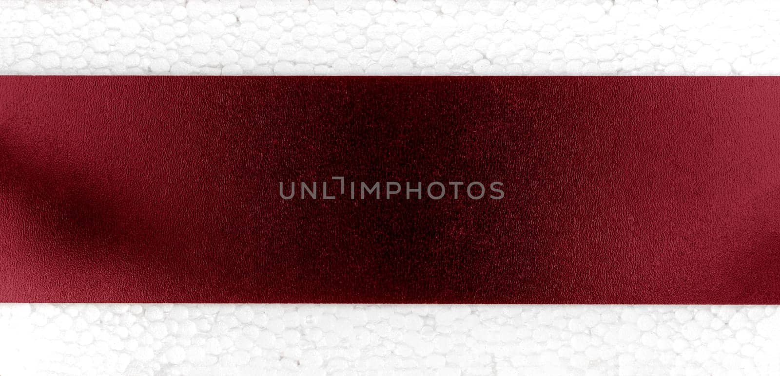 textured wine colored banner with white background.