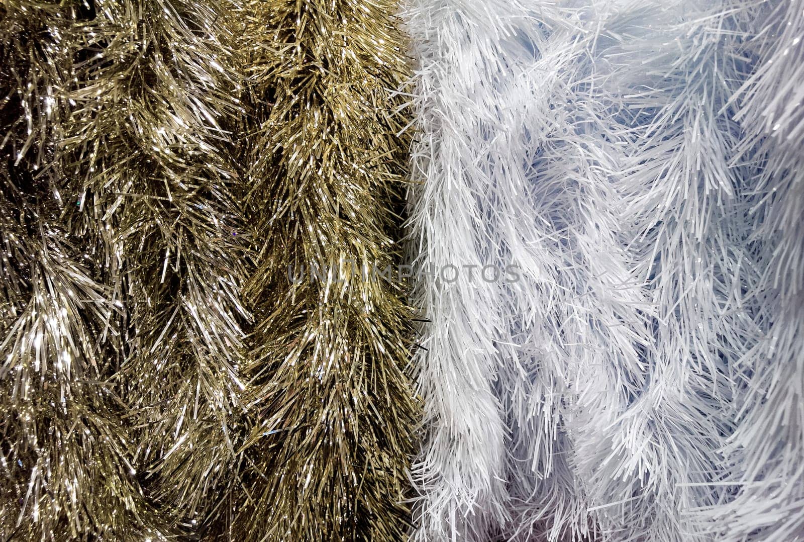 Festive background in a variety of white and gold garlands