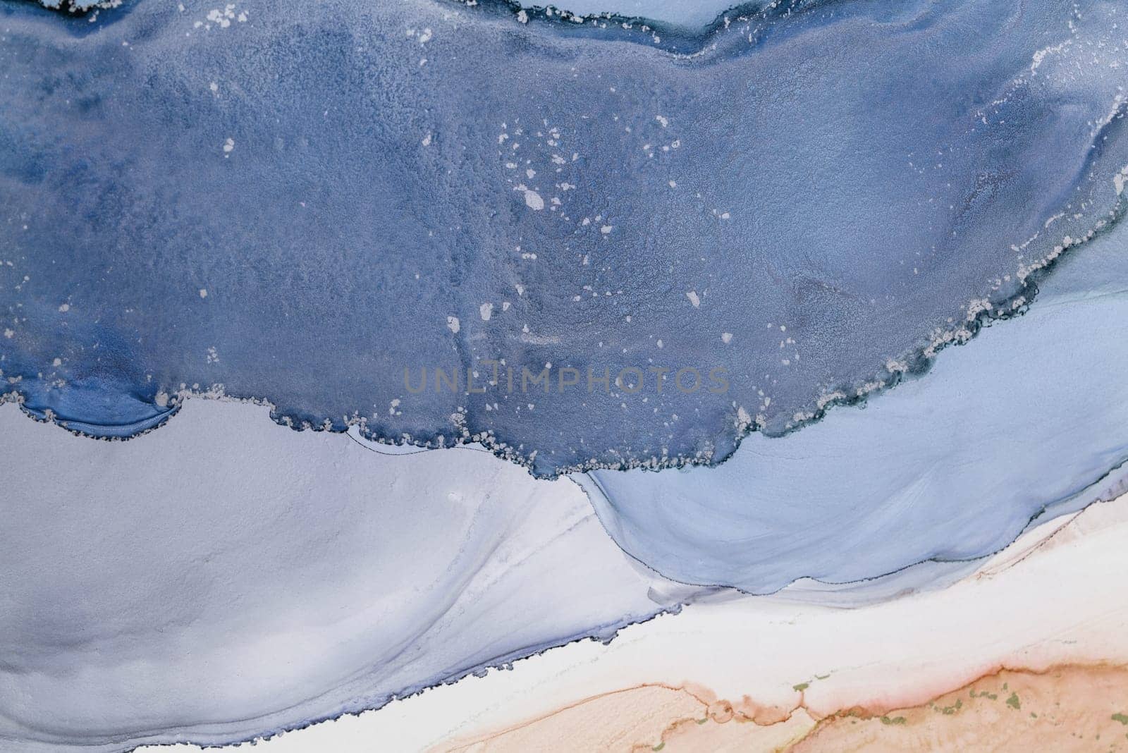 Swirling watercolors come together in shades of blue, grey, and peach, creating a serene and dynamic abstract design that evokes calmness and creativity.