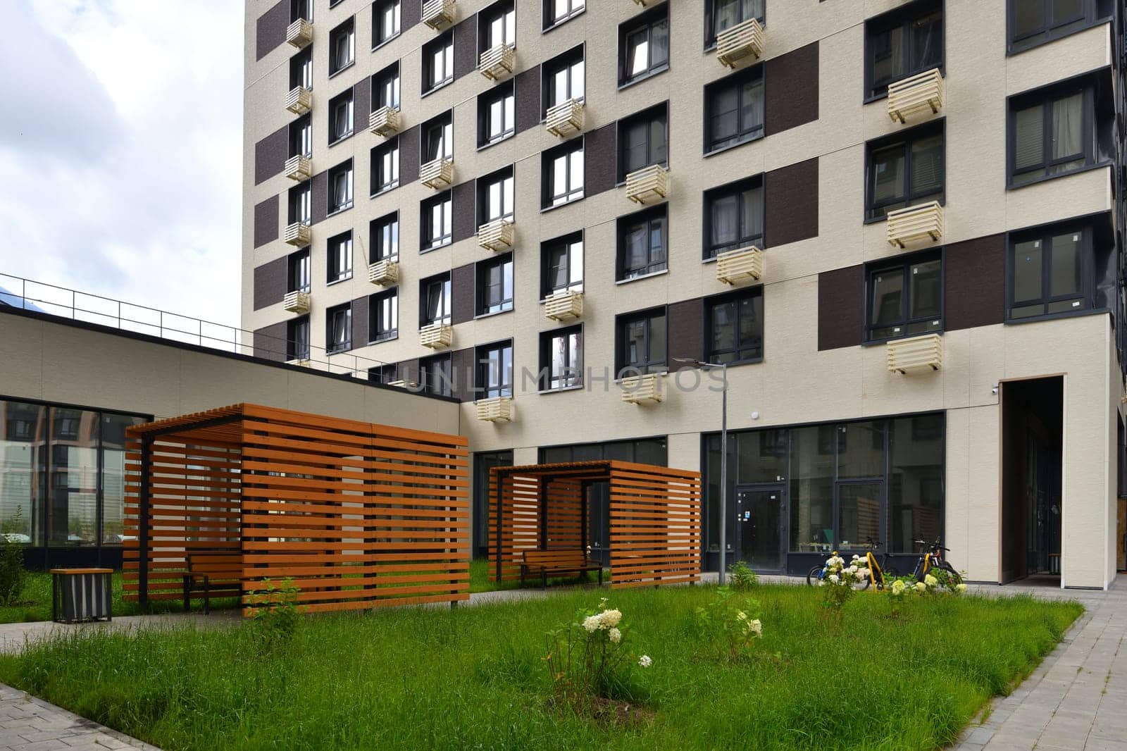 Recreation area with gazebos in area of new buildings in Moscow, Russia