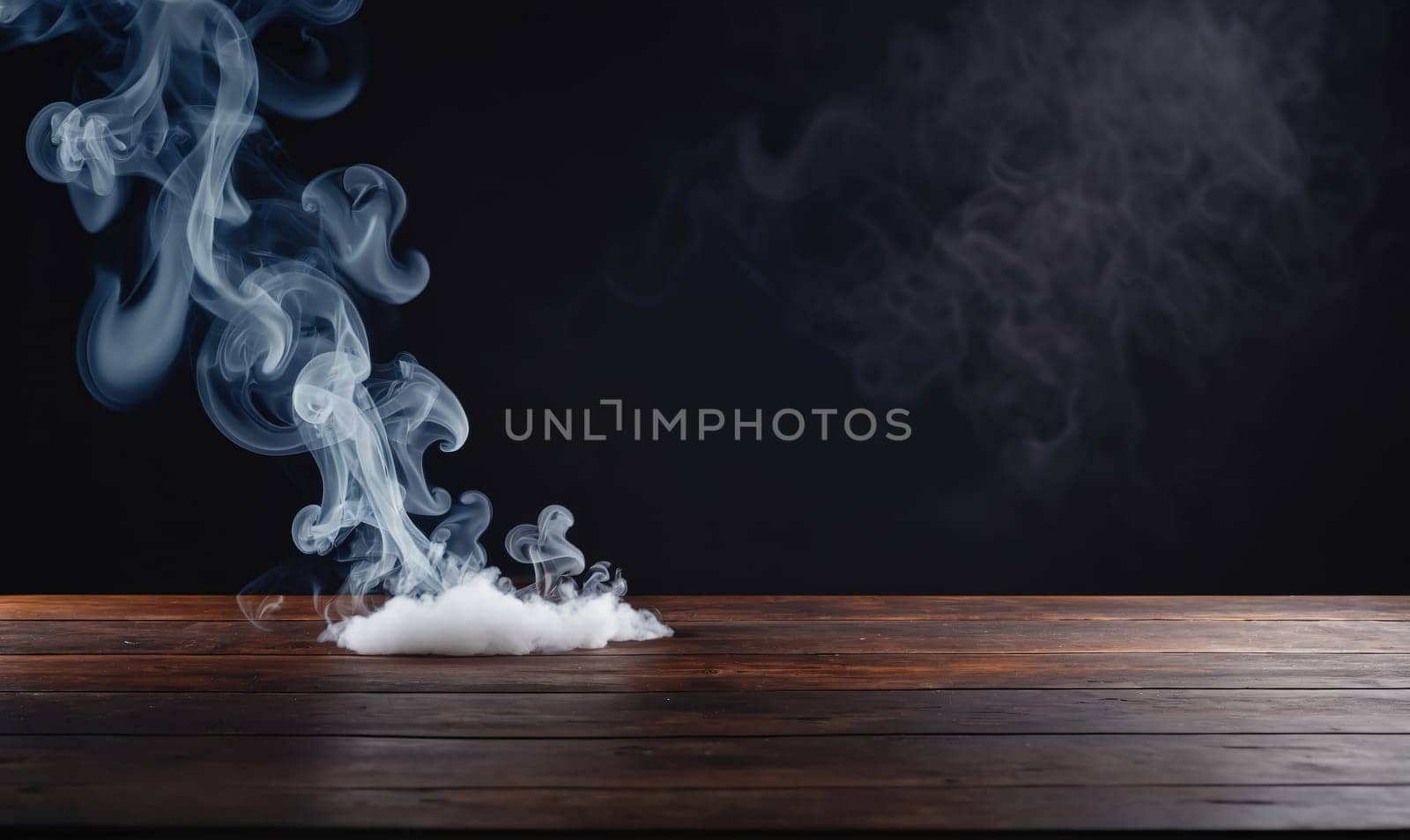 A plume of white smoke rises above a wooden table. It curls into shapes and dissipates into the darkness behind it.
