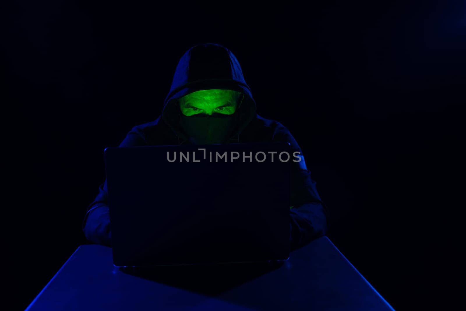 Cyber hacker, Digital Cybersecurity Concept with Hooded Hacker and Computer Interface on Dark Background, Spy anonymous.